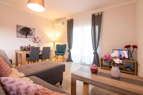 A television and/or entertainment centre at M&M apartments 1