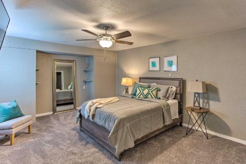 a bedroom with a bed and a ceiling fan at Family Home with Yard Less Than 1 Mi to Cowboys Stadium in Arlington