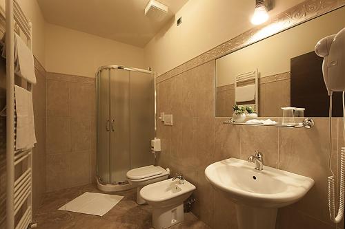 Ванная комната в Hotel Plestina Ristorante Pizzeria