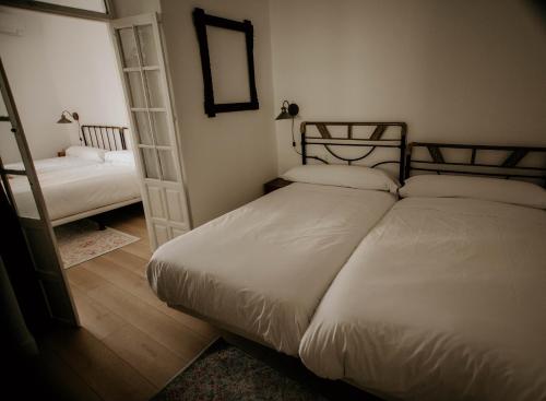 Postelja oz. postelje v sobi nastanitve Casa da Catedral Ramona