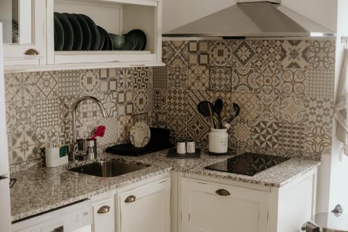 A kitchen or kitchenette at Casa da Catedral Ramona