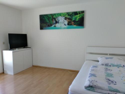 Ένα ή περισσότερα κρεβάτια σε δωμάτιο στο Apartment with Terrace