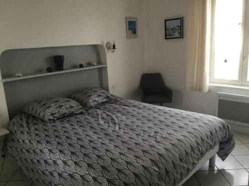מיטה או מיטות בחדר ב-Maison de standing style rethais