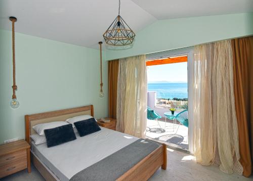 Posteľ alebo postele v izbe v ubytovaní Corfu Sea View Villa - Leo