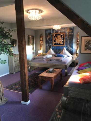 Postel nebo postele na pokoji v ubytování Waldhotel Auerhahn "Hochkopfhaus"