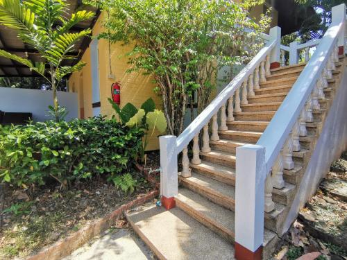 a set of stairs in front of a house at Holiday Villa, Lanta in Ko Lanta