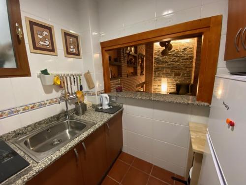 Virtuvė arba virtuvėlė apgyvendinimo įstaigoje Hostal El Horno