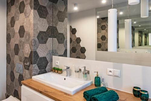 Kúpeľňa v ubytovaní 3D KOSCIUSZKI 19 Apartament