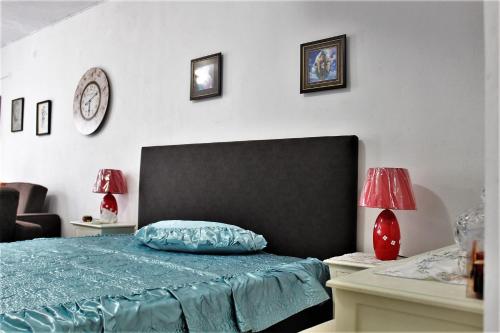Ένα ή περισσότερα κρεβάτια σε δωμάτιο στο Sissy Apartments by the sea