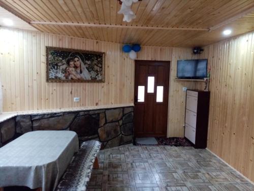 TV a/nebo společenská místnost v ubytování микуличин на долоні