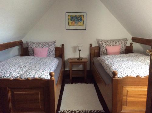 En eller flere senge i et værelse på Ferienwohnung Haumannshof