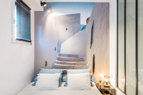 Postelja oz. postelje v sobi nastanitve Super Chazelles - Métro - Hôpitaux Lyon Sud