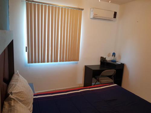 Cama o camas de una habitación en Contry La Silla Apartments zona tec - Nuevo Sur