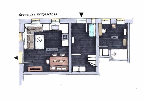 a floor plan of a room with at Urlaub im 200 Jahre alten Fachwerkhaus in Lichtenhain