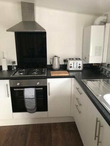 Dapur atau dapur kecil di Daffodil Lodge