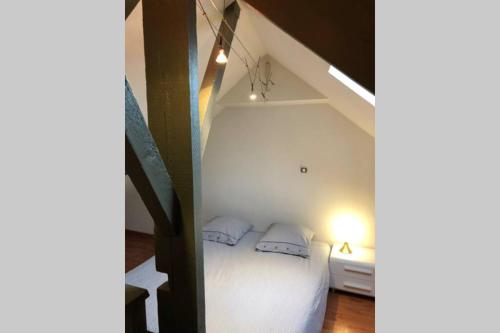 Ένα ή περισσότερα κρεβάτια σε δωμάτιο στο Appartement cosy