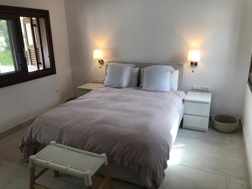 Ένα ή περισσότερα κρεβάτια σε δωμάτιο στο Villa Denni