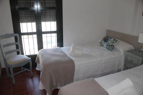 Apartamentos Peregrinosにあるベッド
