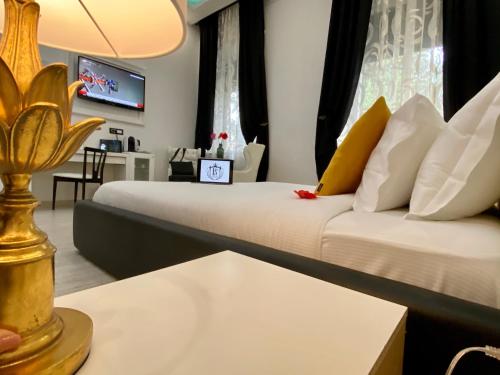 Una cama o camas en una habitación de Escape Luxury Suite - CA Domus Collection