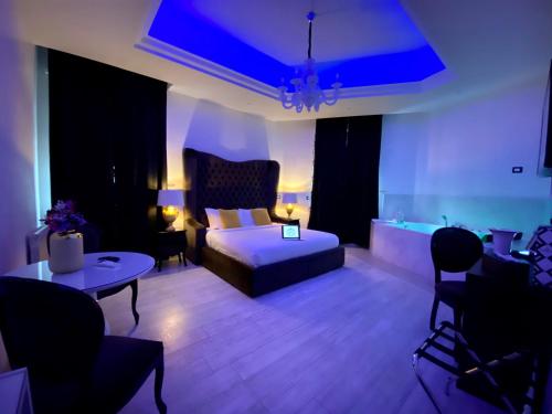 Una cama o camas en una habitación de Escape Luxury Suite - CA Domus Collection