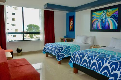 Ένα ή περισσότερα κρεβάτια σε δωμάτιο στο Hotel Casablanca Salinas