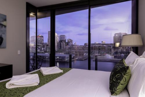 a hotel room with a view of the ocean at AKOM AT Docklands in Melbourne