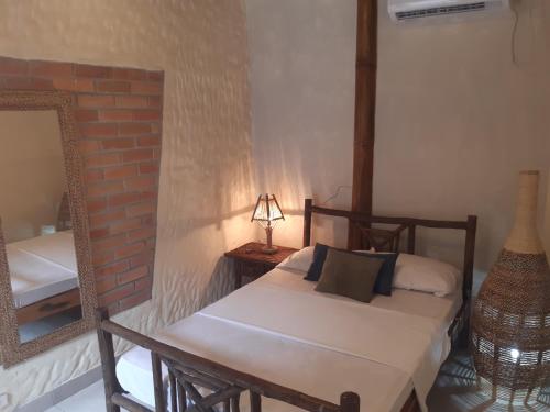 Una cama o camas en una habitación de The Weekend Hostal