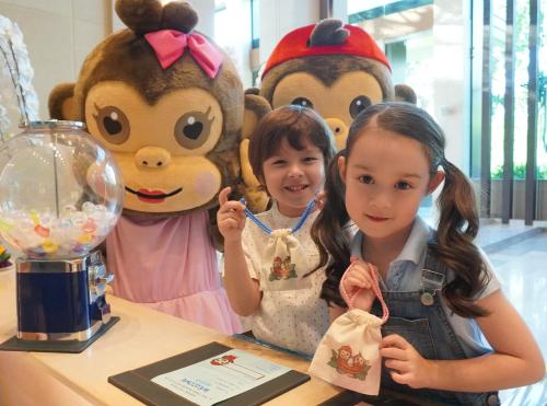 two little girls standing in front of stuffed animals at Amari Pattaya in Pattaya Central