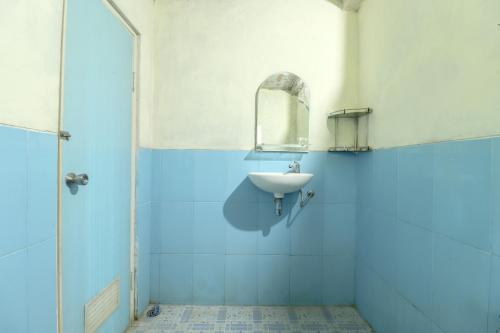 Salle de bains dans l'établissement Jemakir Homestay