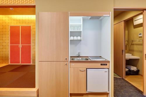 Kuchyň nebo kuchyňský kout v ubytování Hotel Amaterrace Nippombashi-higashi