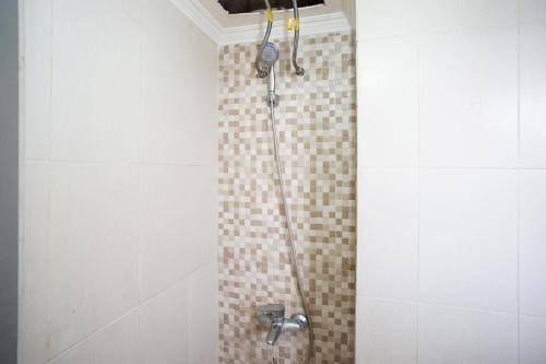 Un baño de Planet Room Kemang View
