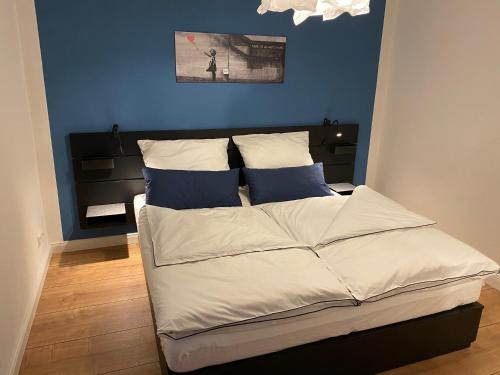 Ένα ή περισσότερα κρεβάτια σε δωμάτιο στο Schwalm-Apartment Treysa
