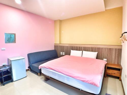 Ένα ή περισσότερα κρεβάτια σε δωμάτιο στο The Sunny Homestay