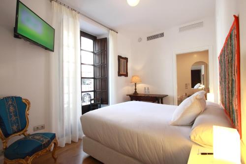 Katil atau katil-katil dalam bilik di Hotel Patria Chica