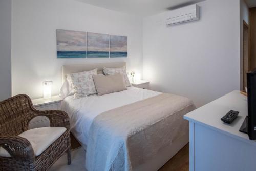 Ένα ή περισσότερα κρεβάτια σε δωμάτιο στο Duplex Flamingo Cadiz