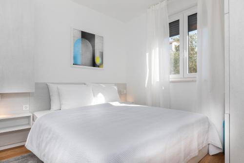 Ένα ή περισσότερα κρεβάτια σε δωμάτιο στο Luxury Apartment La Mer