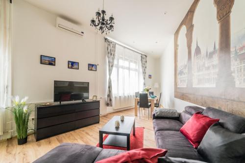 Télévision ou salle de divertissement dans l'établissement Real Apartments Anker