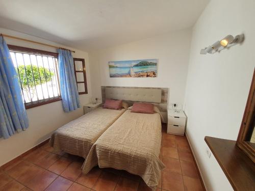 2 bedroom villa 'The Bungalow' with private heated pool.