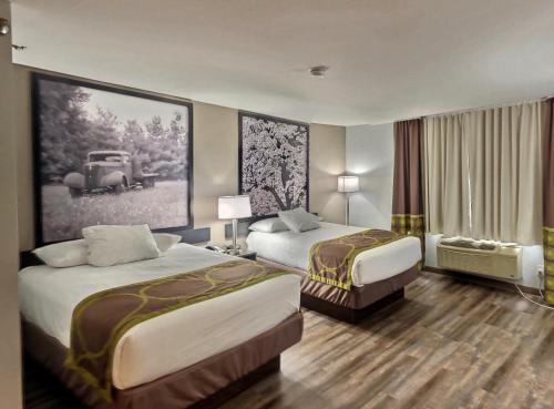 Postel nebo postele na pokoji v ubytování Super 8 by Wyndham Georgetown