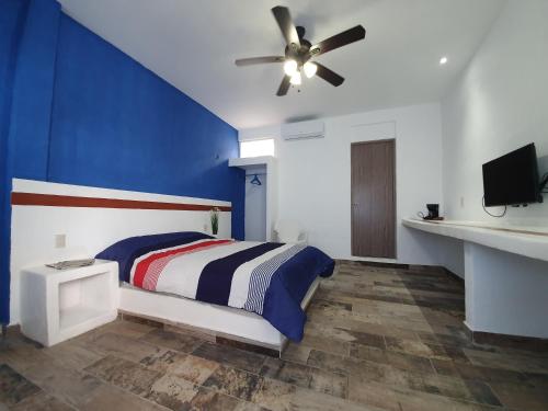Ένα ή περισσότερα κρεβάτια σε δωμάτιο στο Luna Azul