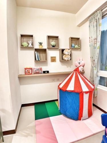 Ένα ή περισσότερα κρεβάτια σε δωμάτιο στο The Sunny Homestay