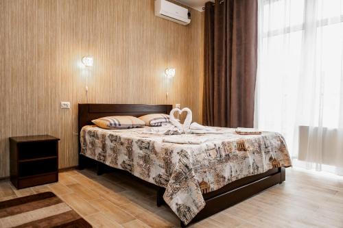 Voodi või voodid majutusasutuse Hotel Orion Plus toas