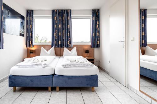 Voodi või voodid majutusasutuse Hotel Fresh INN toas