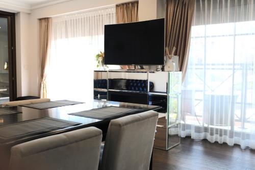 TV/trung tâm giải trí tại Private Luxury Apartment In Nida Centre "Vilnelės Apartamentai"