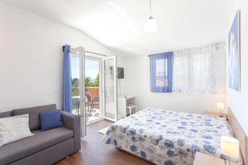 Posteľ alebo postele v izbe v ubytovaní Apartments Lalic