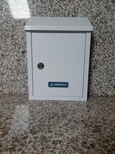 a white box sitting on top of a floor at Avenida apartment 1,2 e 3 in Braga