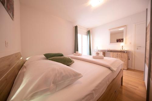 Ένα ή περισσότερα κρεβάτια σε δωμάτιο στο Apartman 2 Relax Zadar