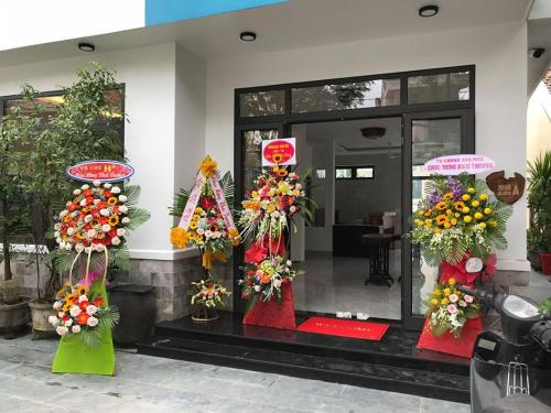 a flower shop with lots of flowers on display at Quynh Long Villa in Hoi An