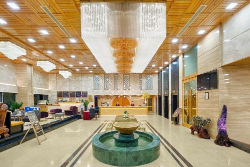 TV a/nebo společenská místnost v ubytování Nhu Minh Plaza Danang Hotel