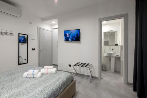 Postel nebo postele na pokoji v ubytování SABRILUNA ROOMS
